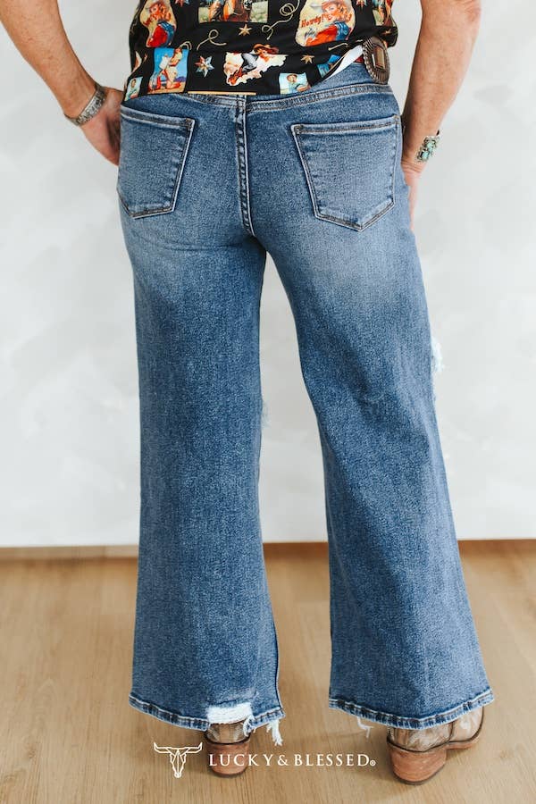 Mid Wash Distressed Mid Rise Wide Leg Frayed Jeans