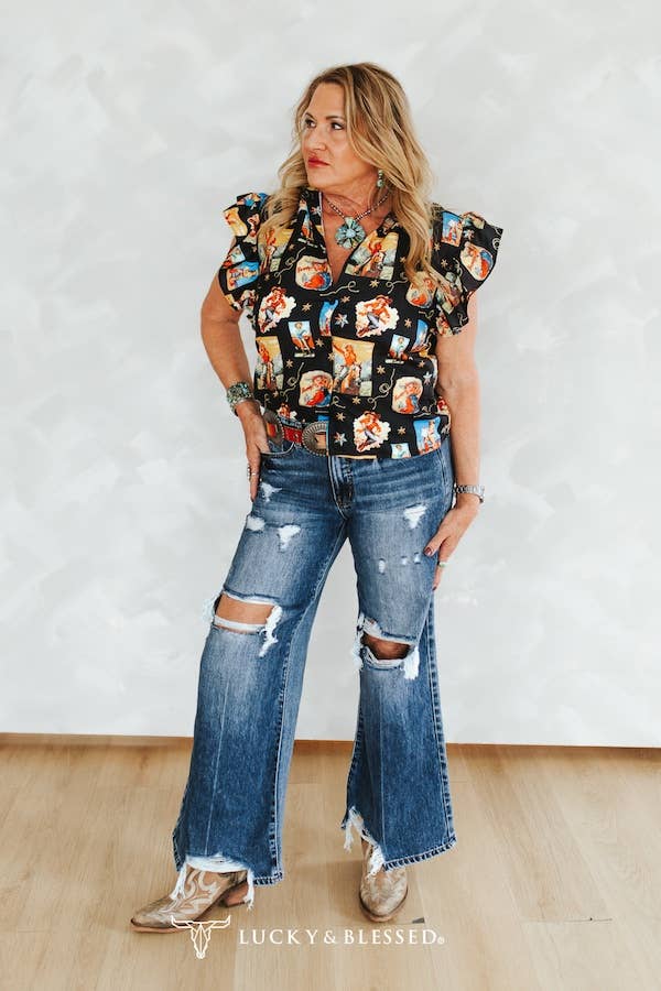 The Distressed High Rise Wide Leg Jeans