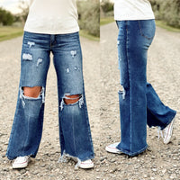 The Distressed High Rise Wide Leg Jeans