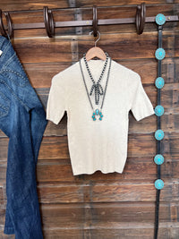 The Ribbed Mock Neck Short Sleeve Sweater