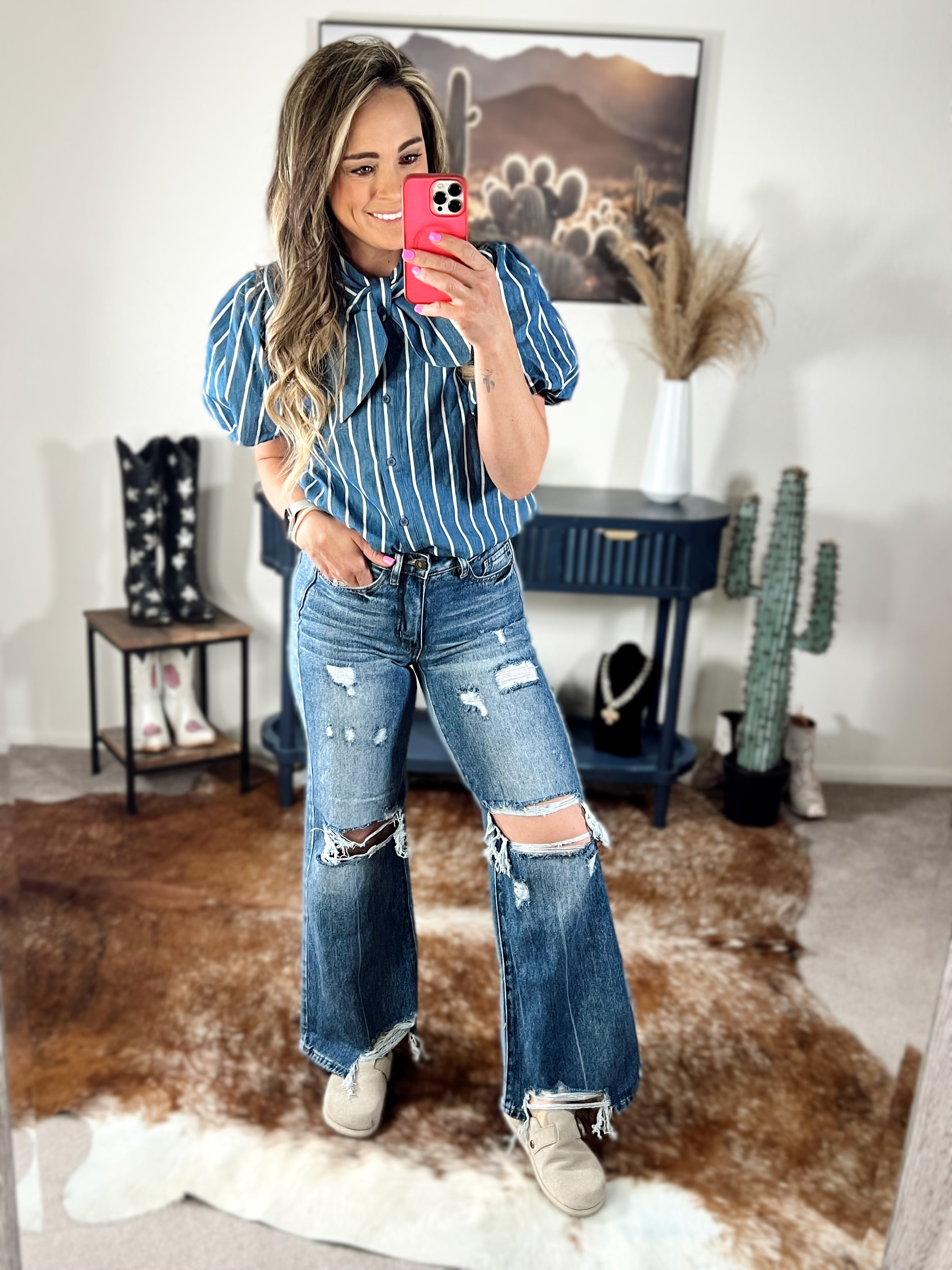The Distressed High Rise Wide Leg Jeans