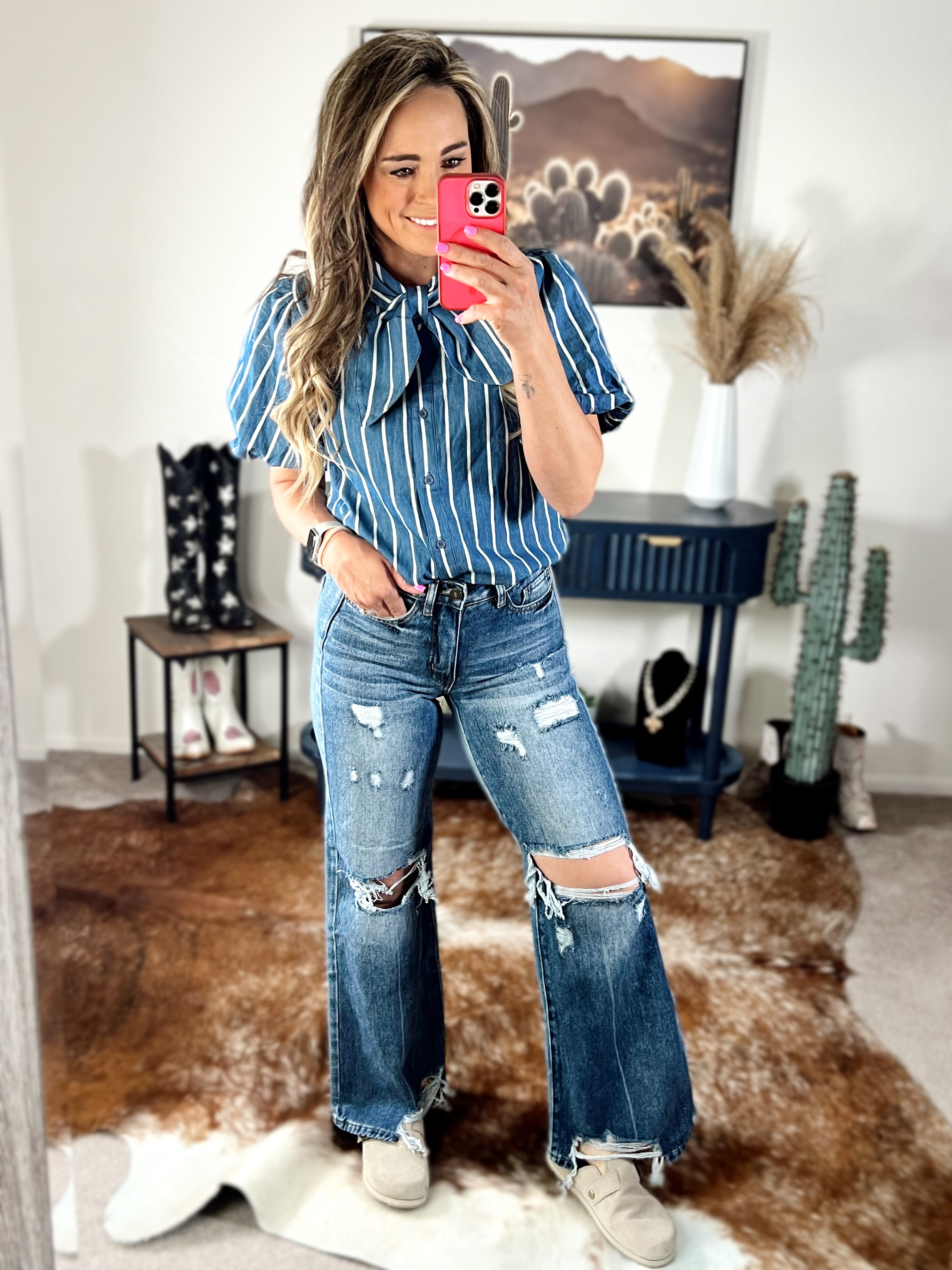 The Distressed High Rise Wide Leg Jeans