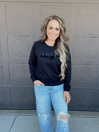 The Ariat Cowgirl Crew Neck Sweatshirt