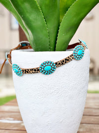 The Turquoise Concho Belt in Leopard