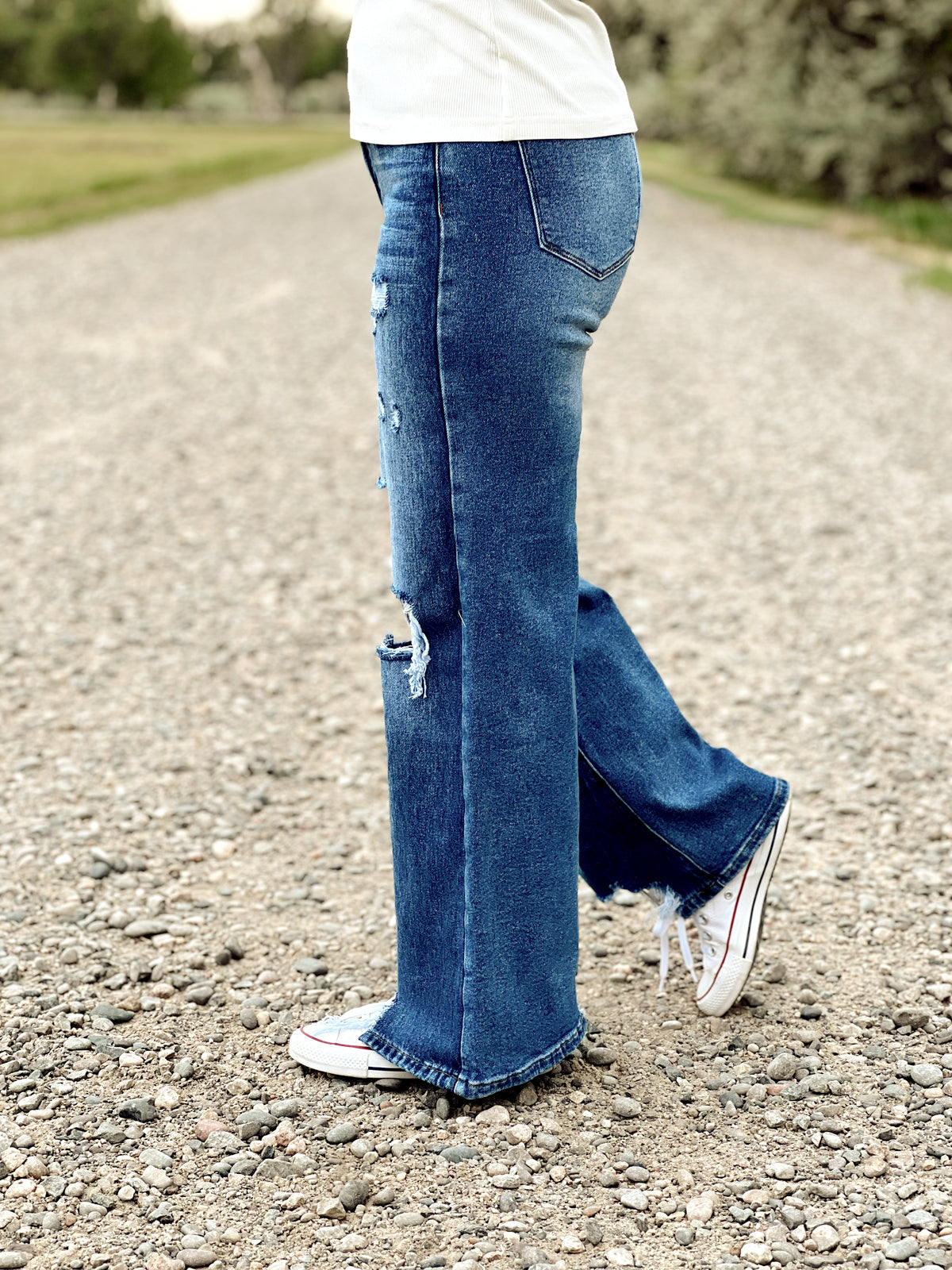 The Distressed High Rise Wide Leg Jeans