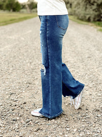 The Distressed High Rise Wide Leg Jeans