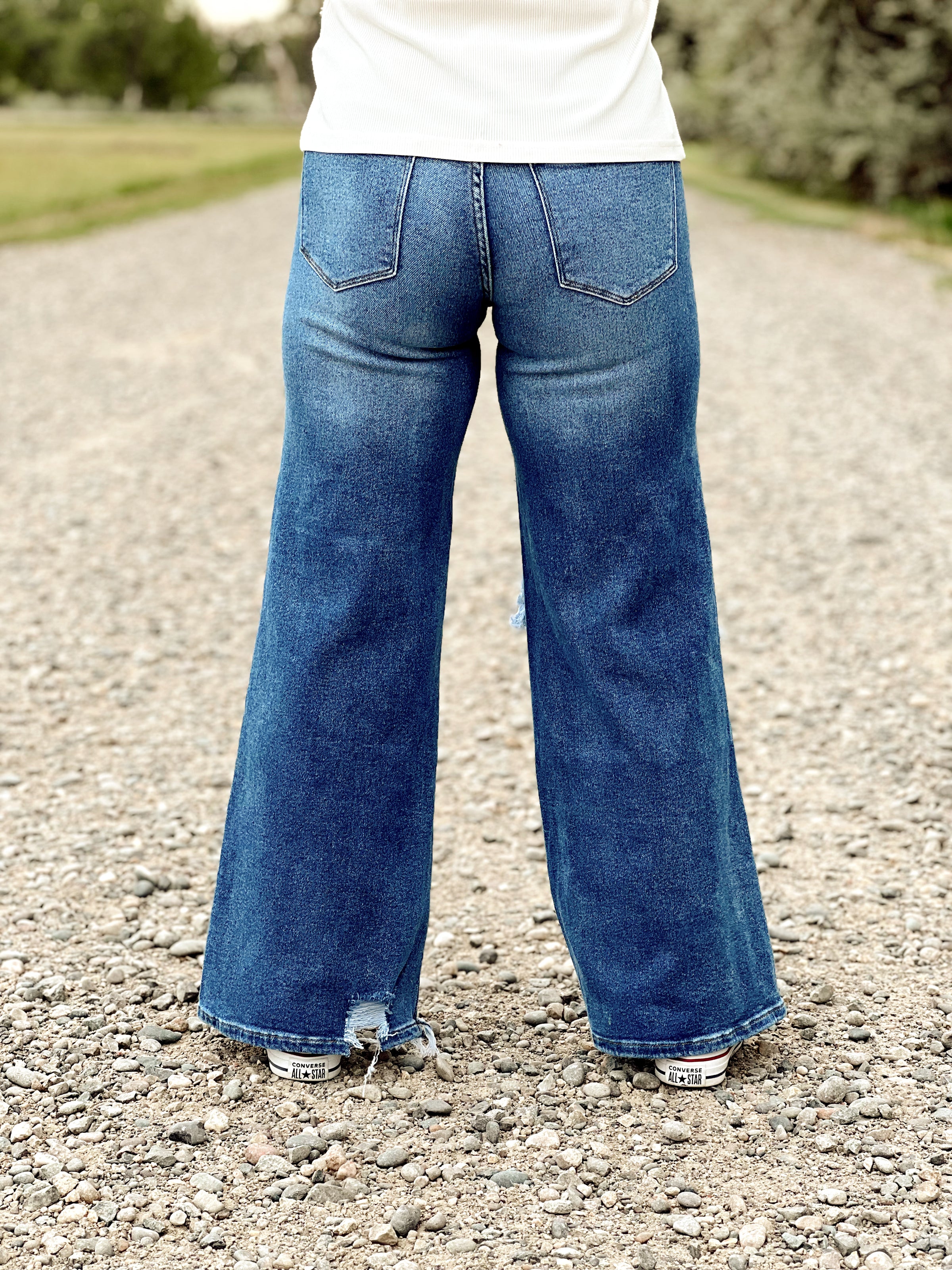 The Distressed High Rise Wide Leg Jeans