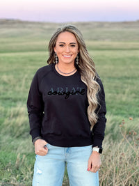 The Ariat Cowgirl Crew Neck Sweatshirt