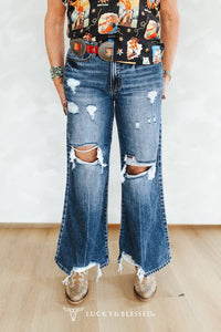 The Distressed High Rise Wide Leg Jeans